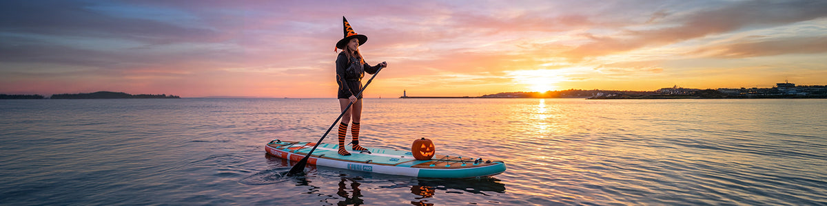 Paddleboarding across a lake in autumn