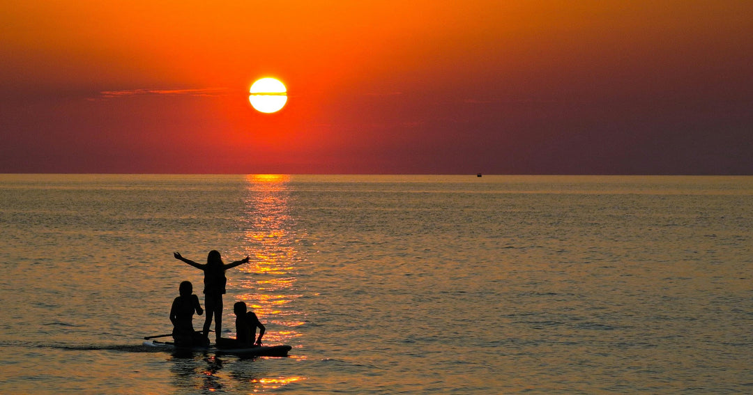 The Best Sunset Paddle Boarding Locations in the U.S.